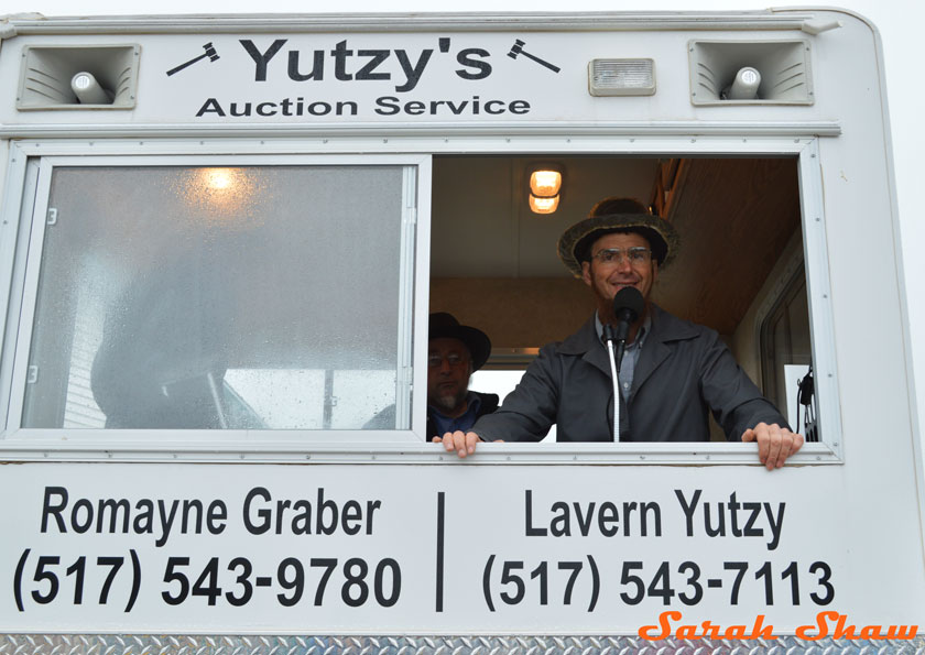 Lavern Yutzy opens his Amish Farm Auction each morning