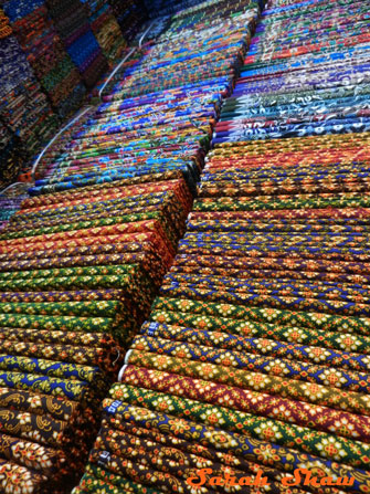 A multitude of sarongs are offered in Bangkok's Chatuchak Weekend Market