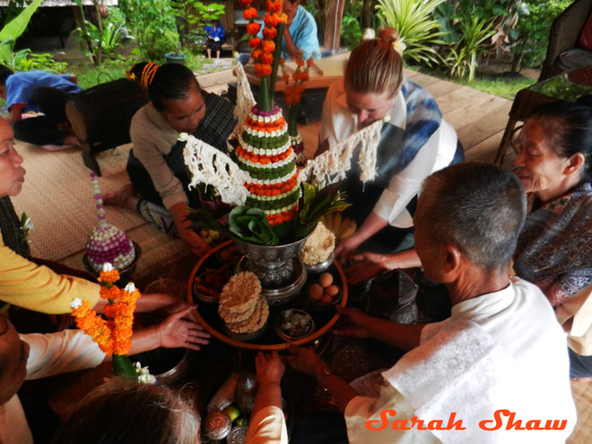 During a baci ceremony at Ock Pop Tok in Luang Prabang, Laos