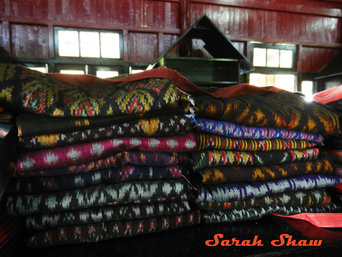 Stacks of ikat for sale at Khit Sunn Yin in Lake Inle, Myanmar