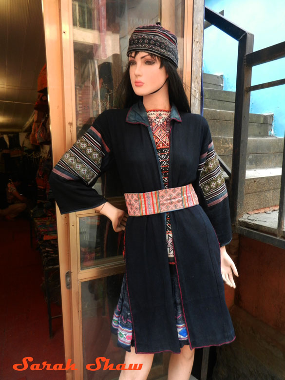 This fashion mannequin shows off a Black Hmong ensemble at a shop in Sapa, Vietnam