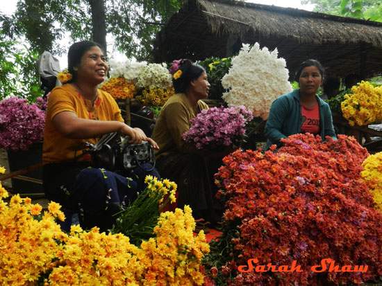 Vendors at the 21 Miles of Mandalay Flower Market in Myanmar