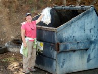 Lisa dumping beach trash