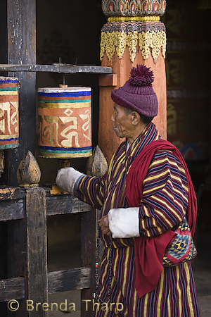 Bhutan Man with Prayer Wheel
