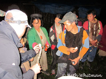 Roasting marshmallows during Eastern Bhutan Trek