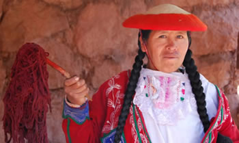 woman with dyed wool in peru