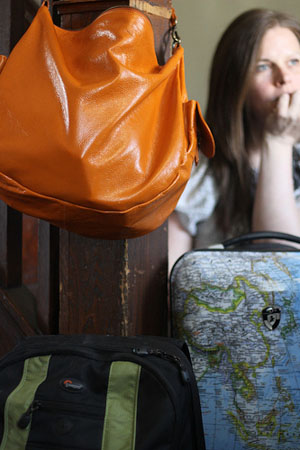 Worried Woman with Luggage