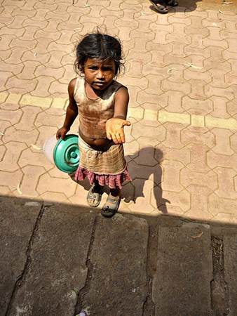 Beggar Girl in India