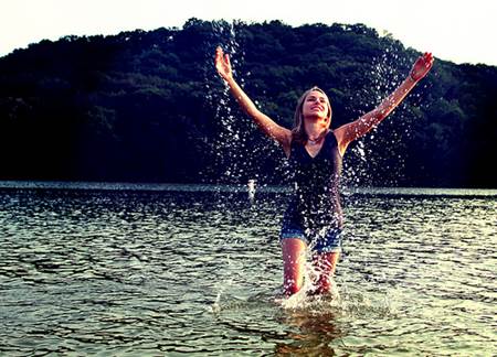 Woman Splashing Water