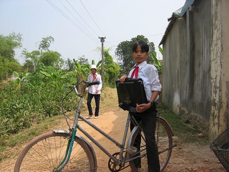 Vietnamese Schoolchild on Bike