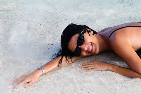 Woman on White Sand Beach