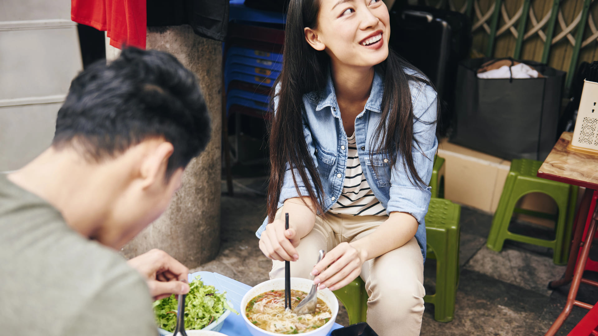 Couple eating pho soup